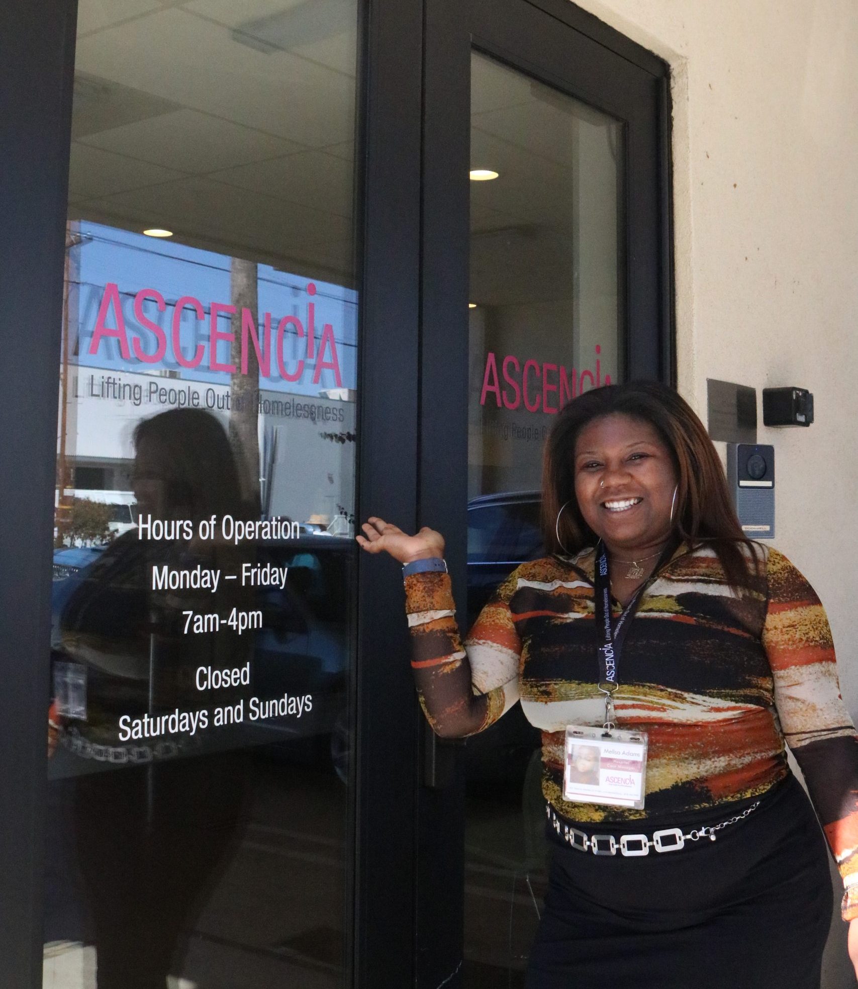 Case Manager standing at Ascencia's front door.